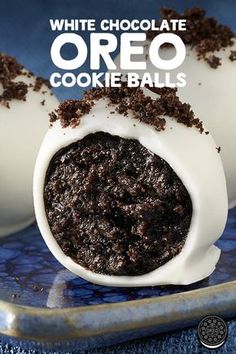 white chocolate oreo cookie balls on a blue plate with text overlay that reads, white chocolate oreo cookie balls