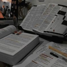 an open book sitting on top of a table