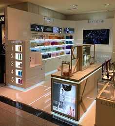 a display case in a store filled with cosmetics