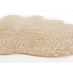 an animal skin rug on a white background