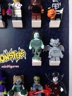 lego minifigures are arranged on the wall to look like they're from halloween