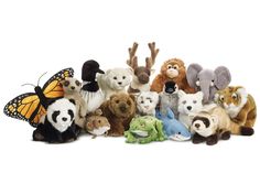 many stuffed animals are arranged together on a white background