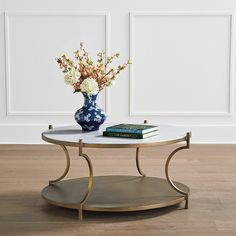 a table with flowers and books on it