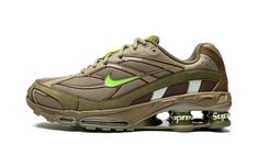 The Supreme x Nike Shox Ride 2 “Neutral Olive” is one of multiple colorways of the retro performance running shoe co-designed by the “World Famous” streetwear brand its Spring/Summer 2022 collection.  The Nike Shox Ride 2 originally debuted back in 2004 before returning in several new colors for Supreme’s 2022 collaboration.  This colorway features a tan mesh upper with overlays designed in olive green and brown leather and nubuck.  In true Supreme fashion, the brand places its signature brandin Mens Nike Shox, Supreme Shoes, Electric Green, Latest Shoe Trends, Green Sneakers, Streetwear Sneakers, Nike Shox, Stadium Goods, Nike Green