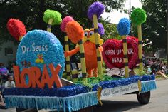 the float is decorated with pom - poms and other decorations for an upcoming event