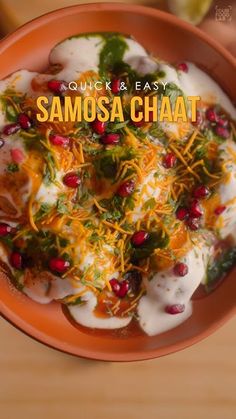 an orange bowl filled with food on top of a wooden table and the words quick & easy samosa chaat above it