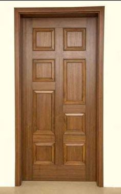 a wooden door with two side panels and one side panel is shown in the same color