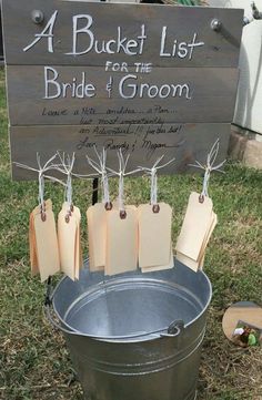 a bucket list for the bride's groom on display in front of a sign