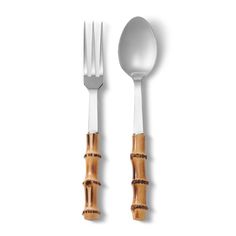 two forks, one with bamboo handles and the other with silverware in it on a white background