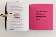 an open book with a pink cover and black lettering on the page, which reads it's about leaving evidence not just of human thought but best of human kind of human hands