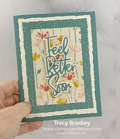 a card with the words feel better soon on it