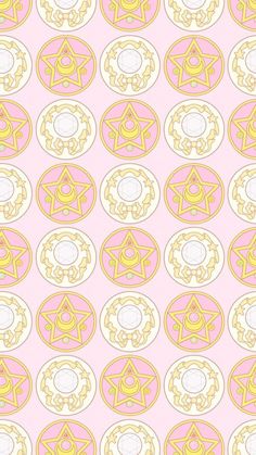 a pink and yellow pattern with various symbols