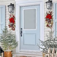 the front door is decorated with christmas decorations