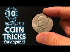 a hand holding a coin with the words 10 must know coin tricks for anyone