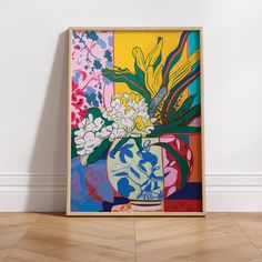 an abstract painting with flowers in a vase on the floor next to a white wall