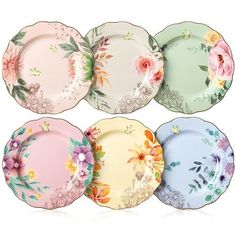 six different colored plates with flowers on them