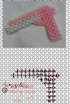 an image of a pink ribbon made out of beads