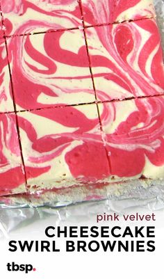 pink velvet cheesecake swirl brownies on tin foil with text overlay that reads pink velvet cheesecake swirl brownies