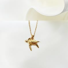 "TINY TURTLE necklace, gold plated Silver 925 realistic Turtle charm, tortoise Animal jewelry, Turtle Lover gift, swimming sea turtle jewelry ♡ DESCRIPTION  A dainty tiny  necklace with beautiful filigree  tortoise charm. ♡ DETAILS   turtle high: 1.4 x 1.6 cm- 0.55\" x 0.62\" Total chain length : 16.5\"(42 cm) Material: gold plated 24 k over sterling silver 925  extender chain you can find here: https://www.etsy.com/listing/723669241/add-an-extender-chain-with-tiny-heart?ref=shop_home_active_2 ♡ Sea Animals Jewelry, Sea Turtle Jewelry, Swimming Sea, Animals Jewelry, Tiny Necklace, Turtle Jewelry, Sea Jewelry, Tiny Turtle, Turtle Charm