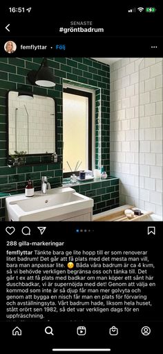 an image of a bathroom with green tiles on the wall and sink in the middle