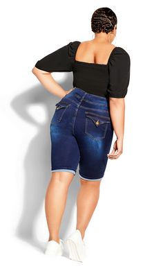 Keep up with the season's hottest new trends with the Killer Pins Short. Boasting a frayed hem with trendy faded detail and a high rise fit, this curve-embracing pair are a summer favorite. Key feature includes: - High rise - Double button and zip fastening - Belt looped waistline - Classic 5 pocket denim styling with flap back pockets - Dark denim wash - Knee length - Rolled cuff - Super stretch denim fabrication Match this short to a cropped denim jacket and a distressed tee! | Plus Size Plus Denim Styling, Cropped Moto Jacket, Plus Size Denim, Distressed Tee, Knee Length Shorts, Indigo Denim, Cropped Denim Jacket, Cuffed Shorts, Denim Collection