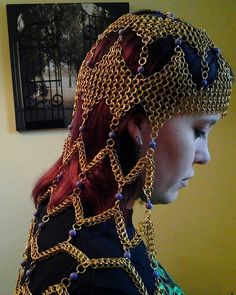 This beautiful flowing headdress is a custom order piece you will need to place an order for this item and customize it your own way .  This chainmail headdress is made from anodized aluminum saw cut rings , the rings are size 18g 1/4 . The weaves used are European 4in1 and half Persian 3in1 .   This beautiful headdress is beaded through out the piece the beads used are glass. If you would like Stone beads please contact me for pricing to add stone beads .  🌈Also if you would like a rainbow one please contact me for custom order,  rainbow will change price.     The measurements I will need is around the crown of the head and we will be able to make a piece that will fit you perfectly .  I will ship out of country , I will need you to message me with your shipping information to quote a sh Chainmail Headdress, Medieval Headwear, Chainmail Clothing, Chainmaille Jewelry Patterns, Fair Outfits, Chainmail Jewelry, Chain Maille Jewelry, Pensacola Fl, Head Wear