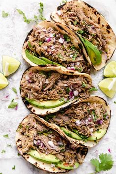 pulled pork tacos with avocado and cilantro