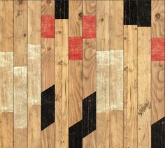 a wooden floor with black, white and red lines painted on the wood planks