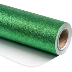 a roll of green glitter paper on a white surface