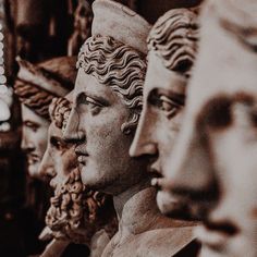 a group of statues sitting next to each other