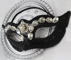 bling cute masquerade mask with black and clean diamonds crystal. If you are interested in a custom order or have any questions please feel free to contact me. made to order for this items Black Adjustable Masquerade Mask For Party, Adjustable Black Masquerade Mask For Parties, Black Adjustable Masquerade Mask For Carnival, Adjustable Black Masquerade Mask For Carnival, Black Masquerade Mask For Halloween Gift, Halloween Eye Mask Gift, Halloween Eye Mask As A Gift, Carnival Rhinestone Eye Mask, Carnival Eye Mask With Rhinestones