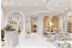 the interior of a salon with white furniture