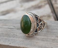 NOTE : WE USED NATURAL GEMSTONES , SO STONE  MAY BE LITTLE DIFFERENT .This  is a listing  of Boho sterling silver ring # metal = sterling silver  925 # Gemstone  - Green Jade# Ring Size - Available in all Size # Stone Color - Green# Stone Shape - OvalHandmade Crafting bohemian Ring - This style has bohemian style . it will look beautiful when you wear it ..Thanks for visiting our shop ...  favorite our shop for daily updates ... Bohemian Green Wedding Rings, Handmade Green Bohemian Ring, Bohemian Green Open Ring, Nickel Free Green Bohemian Rings, Adjustable Green Bohemian Rings, Nickel-free Green Bohemian Rings, Bohemian Nickel-free Green Rings, Bohemian Green Nickel-free Rings, Green Bohemian Sterling Silver Rings