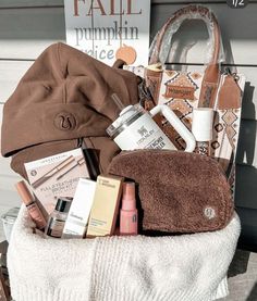 a purse sitting on top of a pile of towels