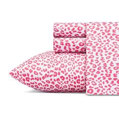 pink leopard print sheets and pillowcases on a white background, with one bed in the foreground