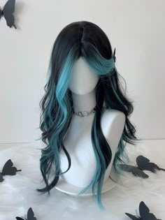 Unleash your inner enchantress with our stunning Synthetic Wig, featuring a captivating blend of deep black tones interwoven with striking Peacock Blue highlights. This luxurious long wig cascades gracefully past the bust, offering an alluring wavy texture that adds volume and movement to your look. Perfect for those seeking a bold yet sophisticated style, this wig is crafted from Heat-resistant synthetic fibers, ensuring a natural appearance and comfortable wear. Razored Haircuts Long, Black Hair Blue Eyes Anime Female, Hair Styles For Ocs, Blue Hair Streaks Brunette, Light Blue And Black Hair, Lavender Highlights Brown Hair, Black And Light Blue Hair, Black Hair Blue Tint, Pink Peekaboo Highlights Brunette