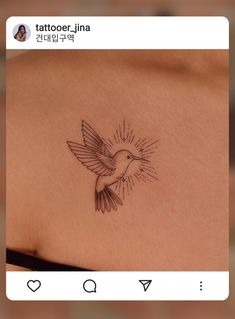 a small bird tattoo on the back of a woman's left shoulder and chest