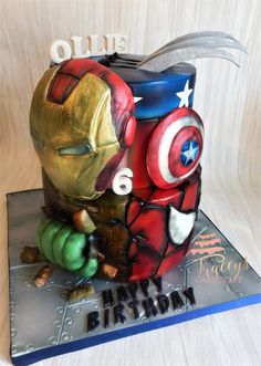 a birthday cake made to look like the avengers