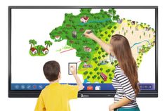 two children are playing with a large map on the tv screen and pointing at it