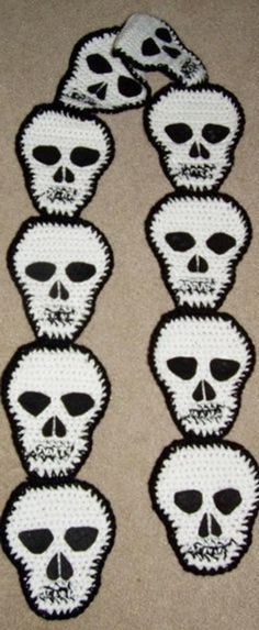 six skulls are lined up on the floor