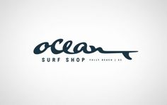 the ocean surf shop logo on a white background