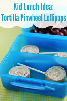 kids lunch idea tortilla pinwheel lollipops with grapes in the background