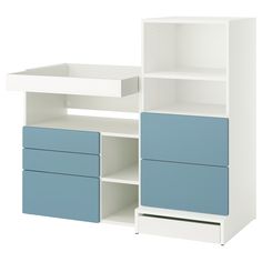 a white and blue bookcase with drawers