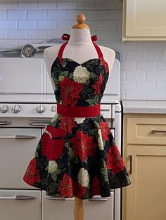 a dress on a mannequin in a kitchen