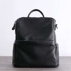 Overview： Design: Black Leather School Backpack Womens Cute College Backpack Purse Black Leather Travel Rucksack for LadiesIn Stock: Ready to Ship (2-4 days)Include: Only BagCustom: NoColor: BlackLeather: Cowhide,Measures: 32cm x 14cm x 30cm Weight: 0.6kgSlots: 2 main slots, 1 back zip slot, 2 outside zip slots, 1 phone pocket, 1 wallet pocket, 1 inside slotAccessories(option): NoneStyle: Black Leather School Backpack Womens Cute College Backpack Purse Black Leather Travel Rucksack for LadiesVer Work Backpack Women, Office Backpack, Best Laptop Backpack, Womens Work Bag, Leather School Backpack, Laptop Backpack Women, Work Backpack, Travel Rucksack, Everyday Backpack