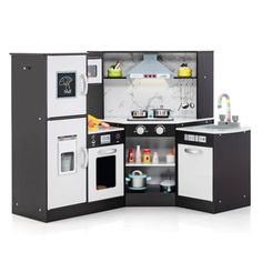 a toy kitchen with black and white appliances