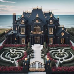 this is an aerial view of a large house by the ocean with beautiful gardens and hedges