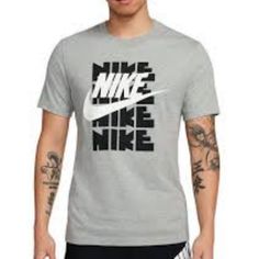 Logo-Topped Tee By Nike Cut From 100% Cotton In A Standard Fit With Short Sleeves & Ribbed Knit Crew Neck. Content + Care - 100% Cotton - Machine Wash - Imported Size + Fit - Measurements Taken From Size Large - Chest: 22” - Length: 29” Purchased At Urban Outfitters. Spring Gym T-shirt With Crew Neck, Nike Casual Workout T-shirt, Casual Athletic Heather T-shirt For Sports, Casual Sports Shirt For Spring, Casual Spring Moisture-wicking T-shirt, Casual Spring T-shirt With Moisture-wicking, Nike Athletic Heather Graphic Print Top, Nike Gray Graphic Print Top, Cotton Gym Top With Logo Print