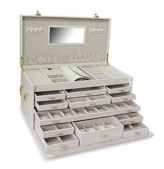 an open white jewelry box with many drawers