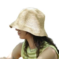 This hat is 100% handmade and crafted from raffia yarn. Raffia yarn is a natural and durable material, ensuring the hat's longevity. The wide brim of the hat is perfect for sun protection and offers a stylish look. This beige hat stands out with its simple and elegant design. It is an excellent accessory for both everyday use and outdoor activities like the beach. Its comfortable and lightweight structure ensures easy and prolonged wear. Raffia. You can store this hat, knitted from raffia rope, in a breathable cloth bag, protect it from fire and heat, and wipe the stains with a clean damp cloth. Beige Straw Panama Hat With Curved Brim, Natural Short Brim Panama Hat, Beige Woven Straw Hat With Curved Brim, Lightweight Natural Straw Hat For Spring, Lightweight Short Brim Straw Hat, Beige Woven Straw Hat With Short Brim, Woven Straw Hat With Curved Brim, Lightweight Natural Straw Panama Hat, Natural Lightweight Straw Panama Hat